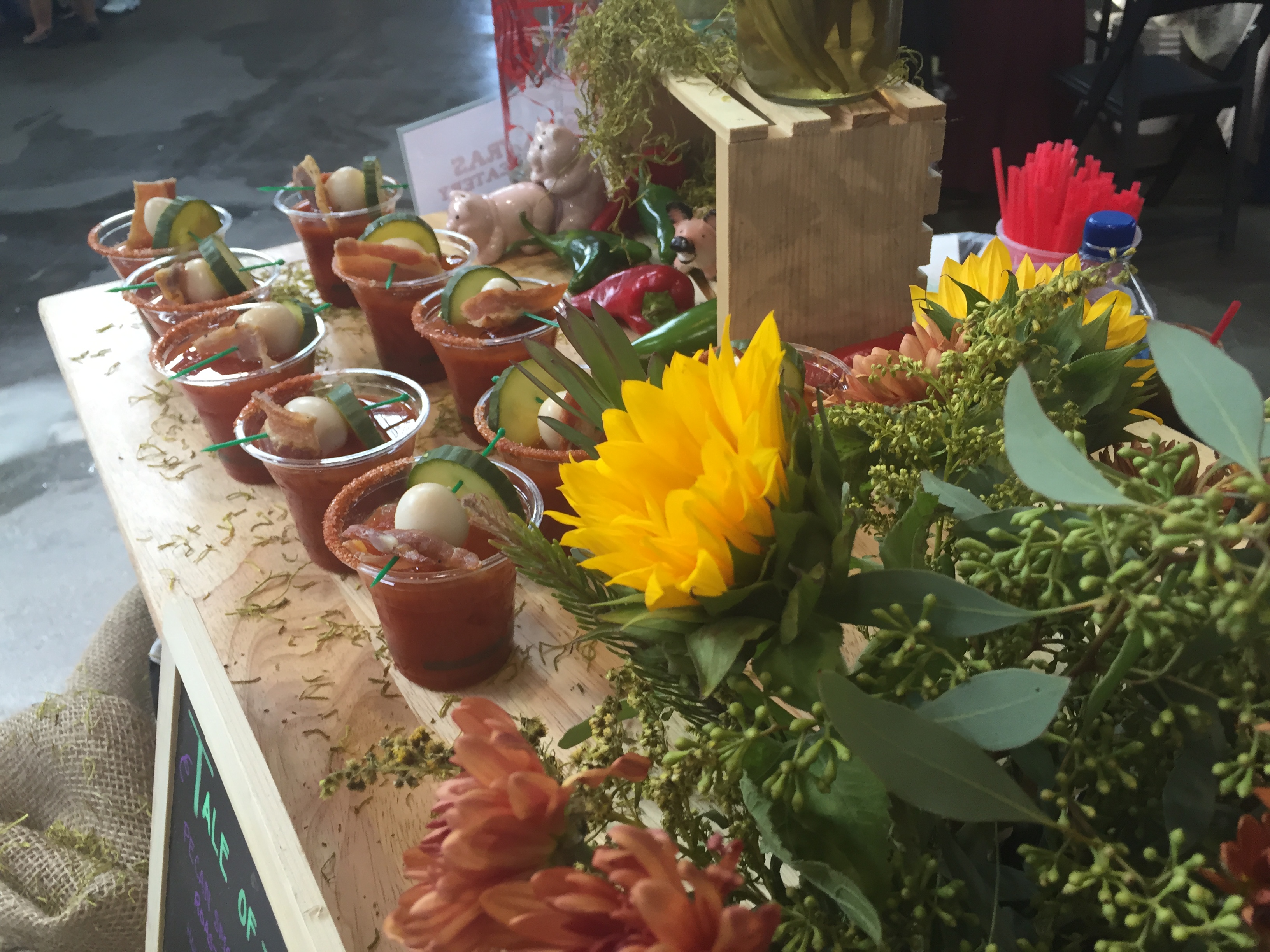 Bloody Mary flight with sunflowers at Sassafras American Eatery